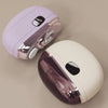 A pair of pink and cream rechargeable electric nail clippers and grinders shown from above.