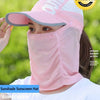 A woman wearing a pink sunshade sunscreen hat and face cover outdoors.