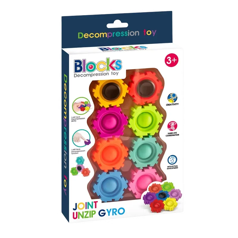 A box of Blocks Decompression toy featuring various colored gears and a joint unzip gyro set.