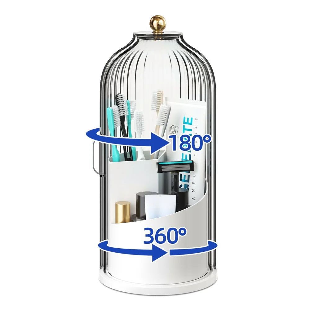 A clear glass rotating toothbrush holder with a dome cover showing various toothbrushes and accessories.