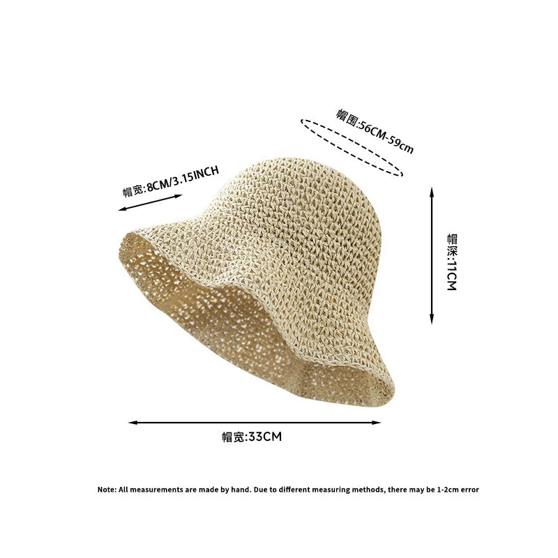 A beige crochet straw fisherman hat with a wide brim shown from the side.