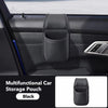 Black multifunctional car storage pouch with a cup holder and phone pocket installed in a car door panel.
