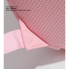 Pink mesh fabric of a toddler girls' cute mushroom backpack showing the strap detail.