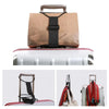 Adjustable elastic luggage straps shown with a brown leather handle and red accents on a suitcase.