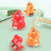 A set of orange and red animal racing cars climbing a green track with stairs.