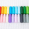 A row of colorful wooden puzzle pieces arranged in a line.