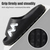Black anti slip wear-resistant durable EVA slide slippers shown from the side with a close-up texture view