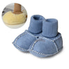 Pair of baby suede leather winter booties with soft fur lining in blue