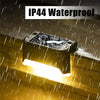 A solar powered deck light illuminates a wooden surface, demonstrating IP44 waterproof protection.
