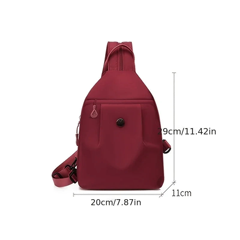 A maroon lightweight oxford cloth mini backpack shown from the back with dimensions provided.