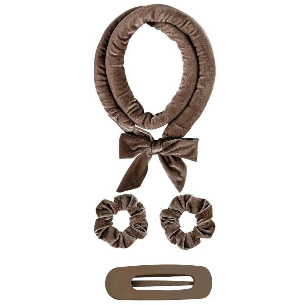 A brown satin heatless overnight curling headband tied in a bow, shown with the elastic band.