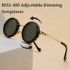 A pair of ND2-400 adjustable dimming sunglasses with gold accents shown on a white surface.
