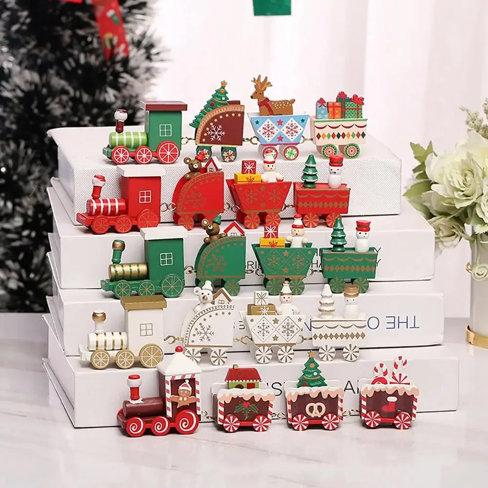 A display of colorful mini train decorations and Christmas-themed toys arranged on white stacked boxes.