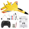 Yellow SU-27 foam airplane model with wings and fuselage, along with a remote control transmitter and battery.