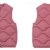 A pink quilted vest for a child shown from the front.