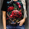 A woman wearing a black t-shirt with a vibrant red rose floral print against a dark background.