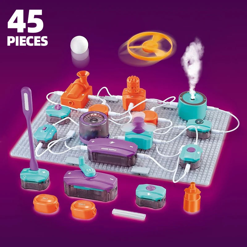 A set of 45 electronic circuit building blocks and components on a white board.