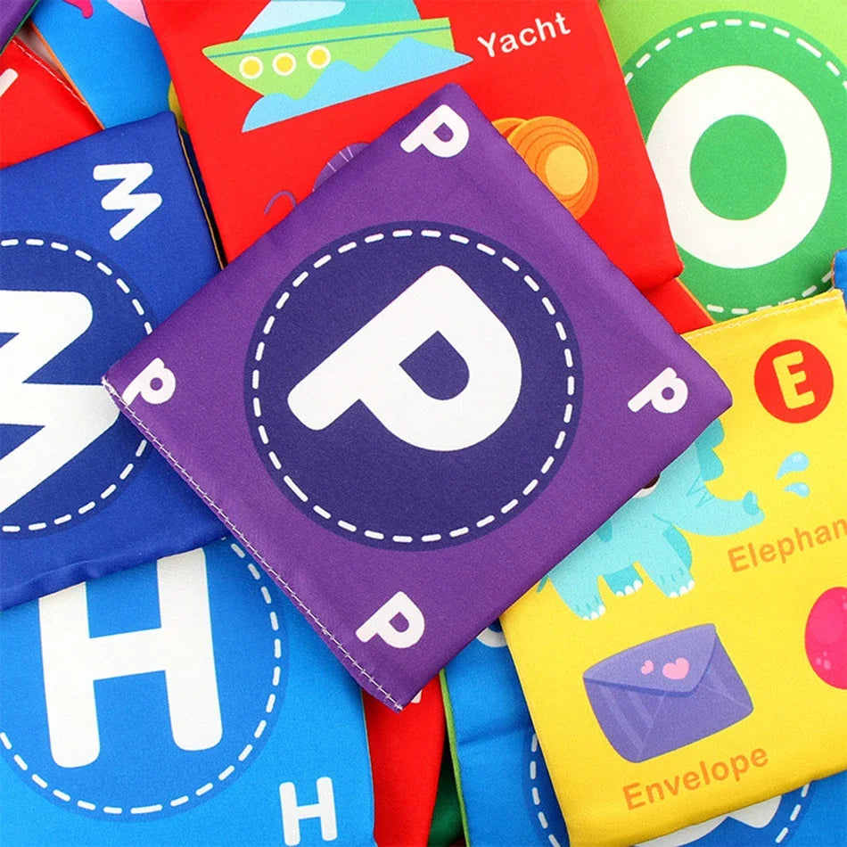 A colorful stack of baby soft cloth alphabet and number flash cards with storage bags.