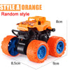 Orange pull-back stunt SUV toy car with black and orange tires