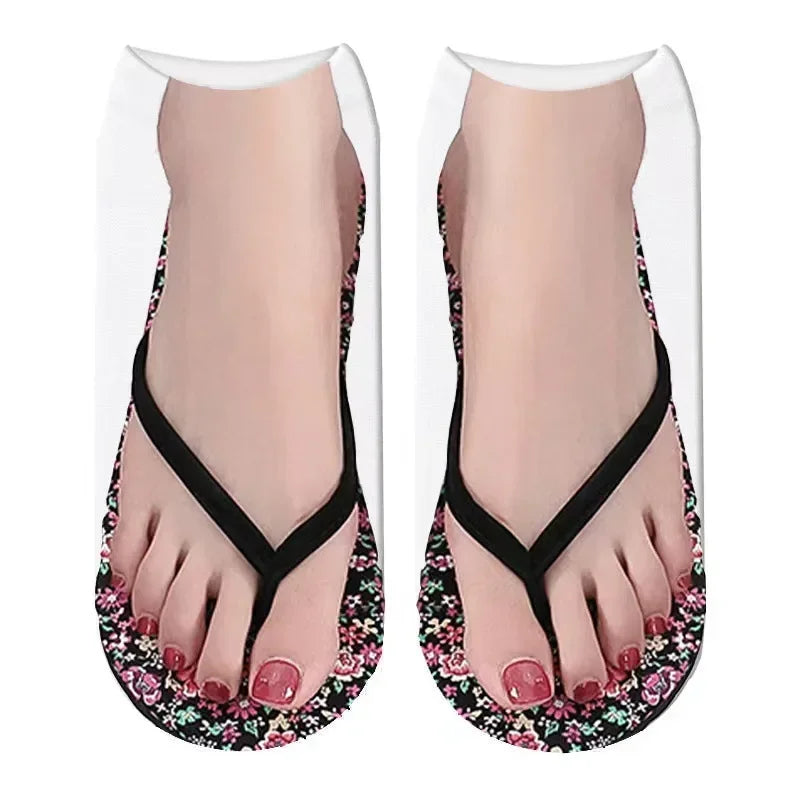 Paire de tongs noires originales avec imprimé floral sur la semelle