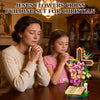A woman and a girl are looking at a wooden Jesus cross flower building set on a table.