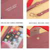 A pink leather handbag featuring a touch screen pocket and adjustable shoulder strap with hardware snaps.