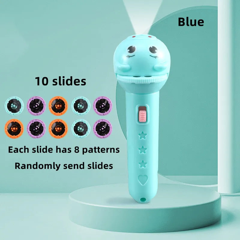 A blue kids projector flashlight with a cute face design and ten slides is displayed on a light green surface.