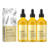Three glass bottles of EELHOE Rosemary Hair Growth Oil with yellow liquid and black dropper caps.