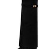 Black knee-high boots with a metallic buckle and a fitted cuff.
