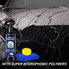 Botella de producto hidrofóbico CarGlass con un paño amarillo y gotas de agua sobre una superficie oscura.