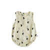 A cream-colored baby cotton sleeveless jumpsuit bodysuit set with small black crescent moon patterns.