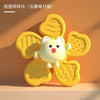 A cute, round, yellow animal toy is shown with five suction cup spinners, designed for toddlers.