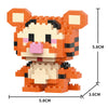 An orange and black micro building block figurine of a tiger face.