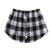 A black and white plaid shirt extender with an elastic waistband.