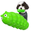 A bright green bug-shaped squeaky toy resembling a caterpillar is held by a dog.