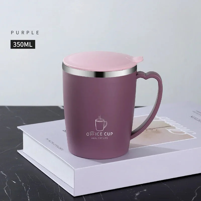 A purple 350ml stainless steel insulated travel mug with a pink lid is displayed on a white box.