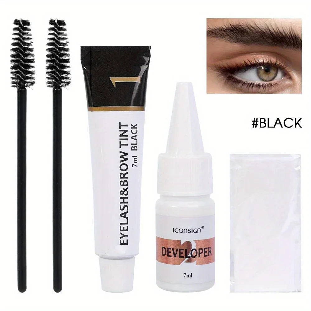 A kit containing black eyebrow and eyelash tint developer bottles and applicators.