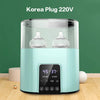 A modern electric baby bottle warmer and sterilizer in light mint green and black, showing two glass bottles inside.