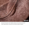 Close-up of a brown cotton vest showing the shoulder pressure strip webbing detail.
