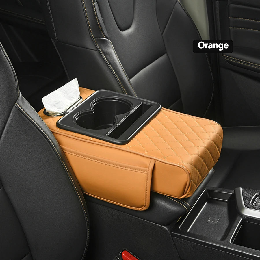 Orange car center console organizer with armrest cushion and cup holder placed on a black car seat.