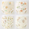 A set of four reusable cotton potty training pants for toddlers in light yellow with a floral pattern.