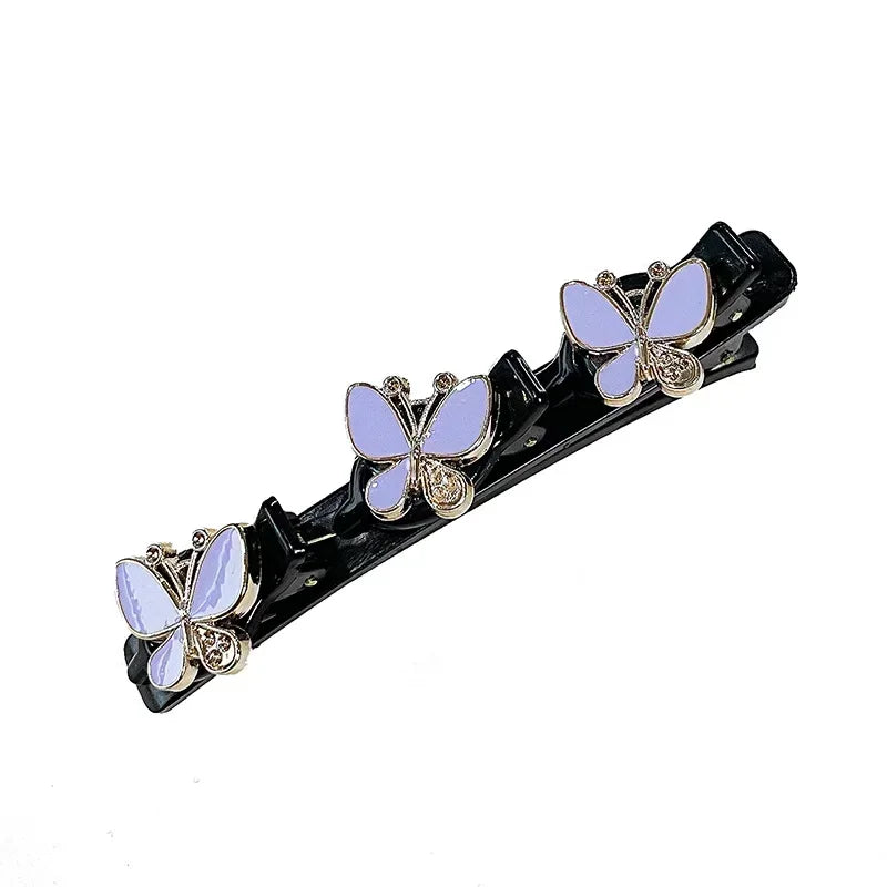 Clip de pelo negro de doble capa trenzado con adornos de mariposa plateadas