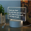A glowing acrylic message board lamp displaying the text Thank you Sam The last time you sent me gift I like it very much I w