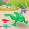 A set of colorful jumping frog toys in green, purple, and red are displayed on a light background.