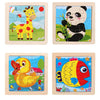 A set of four wooden jigsaw puzzles featuring a giraffe, a panda, a yellow duck, and a yellow fish.