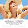 A woman wearing a straw hat is smiling outdoors, demonstrating antioxidant protection with grape seed extract.