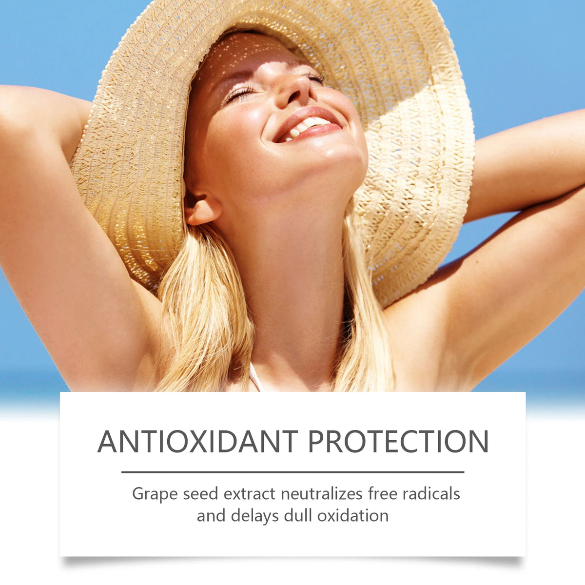 A woman wearing a straw hat is smiling outdoors, demonstrating antioxidant protection with grape seed extract.