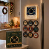 A magnetic vinyl record player night light with interchangeable discs displayed on a shelf.