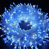 Blue waterproof LED fairy string lights wrapped in a circular shape for indoor and outdoor decoration