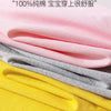 Stacked pink, gray, and yellow children's t-shirts folded together